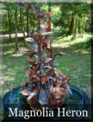 Copper heron fountain with magnolias