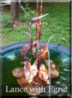 Small copper egret fountain