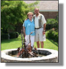 Heron fountain with owners in Dallas