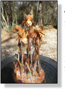 Copper iris dripping fountain