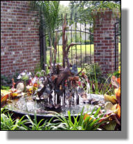 Same copper fountain as to the left but after really nice landscaping job.