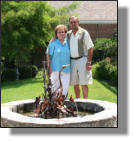 Heron fountain with owners in Dallas