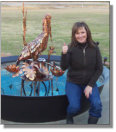 New owner Donna with her Pelican fountain in New Iberia, LA