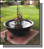 Nice brick pad for fiberglass Louisiana sugar kettle and copper fountain