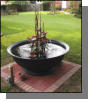 Nice brick pad for fiberglass Louisiana sugar kettle and copper fountain