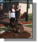 Lance One owners with fountain in clay pot